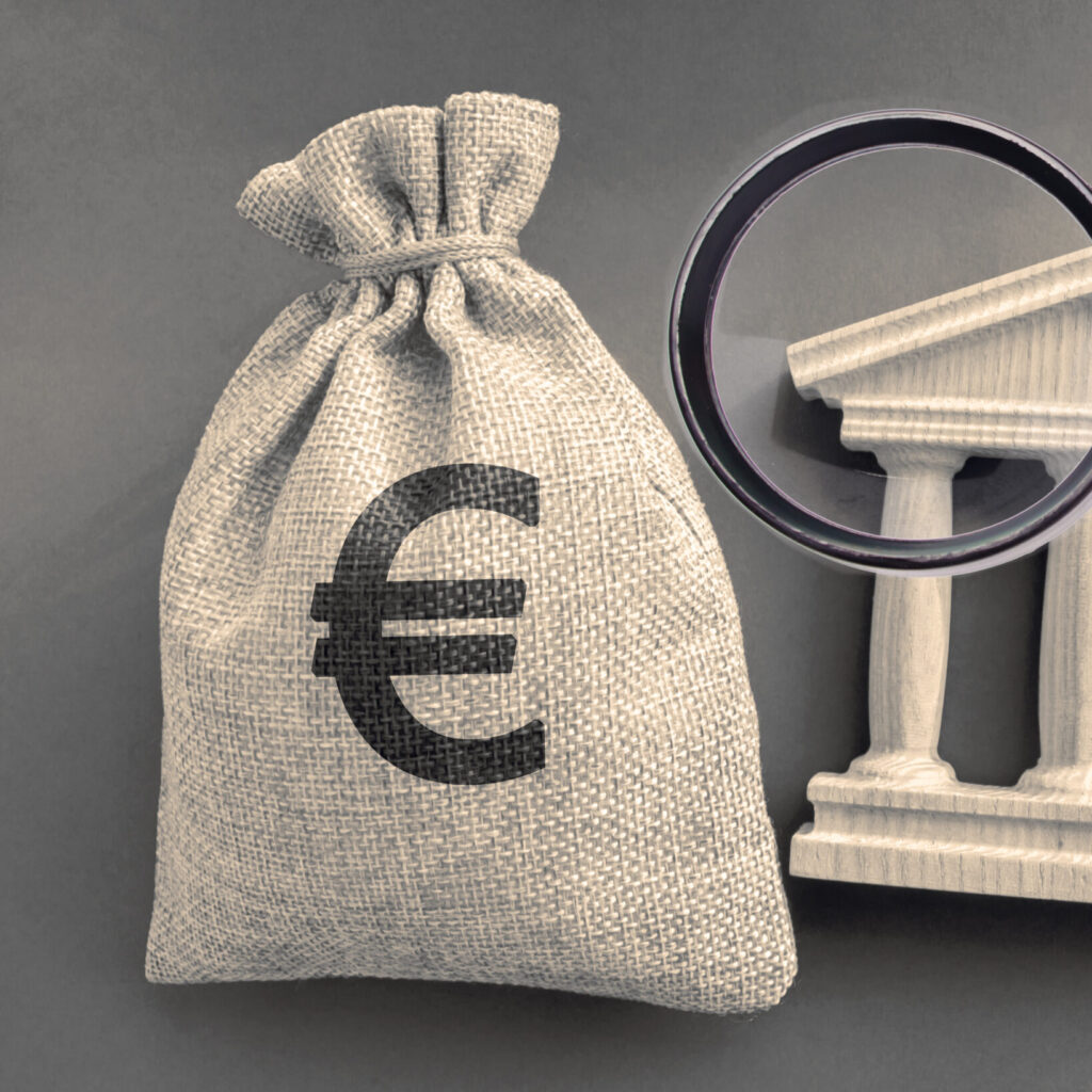 Euro money bag and government building. Business and finance concept. Deposit, loan and investment in to the bank. Credit. Help from the state. Subsidies and Benefits. Budget.